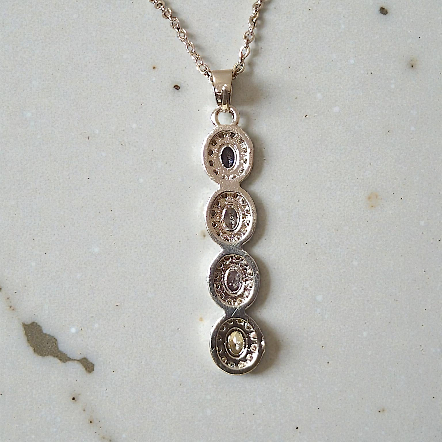 The Spectrum Halo Vertical Drop Necklace